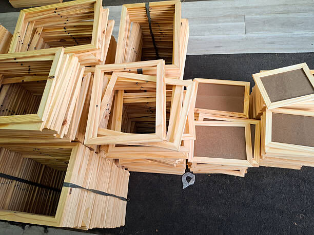 Man polishing wood surface